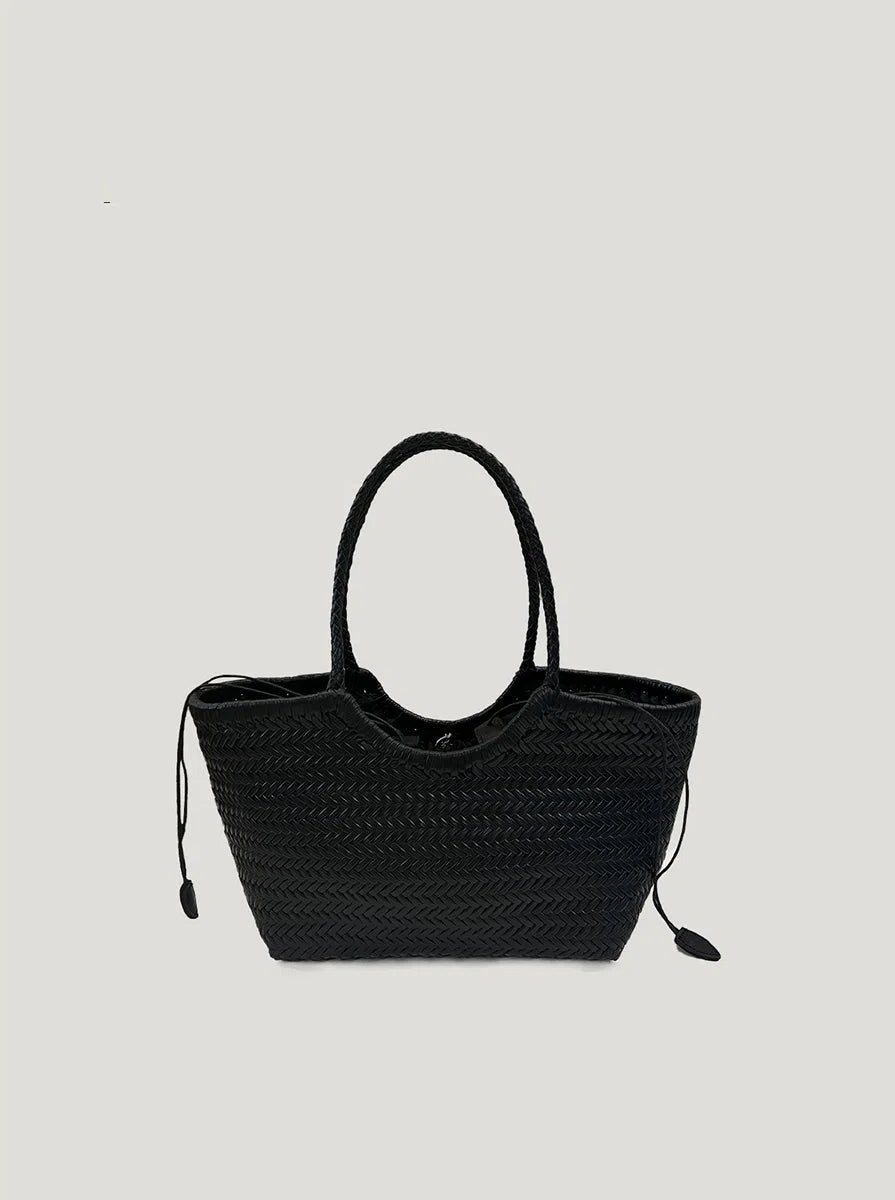 A black woven leather tote bag with a nested bag, featuring a spacious design and top handles. Set against a white background, the bag showcases its intricate woven patterns and stylish, functional design.